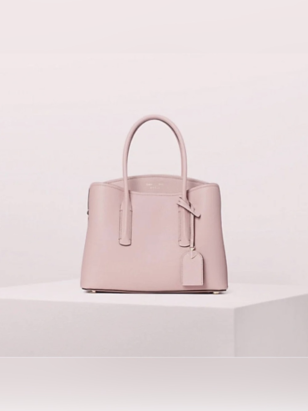 Kate Spade pale pink pebbled leather purse with crossbody strap